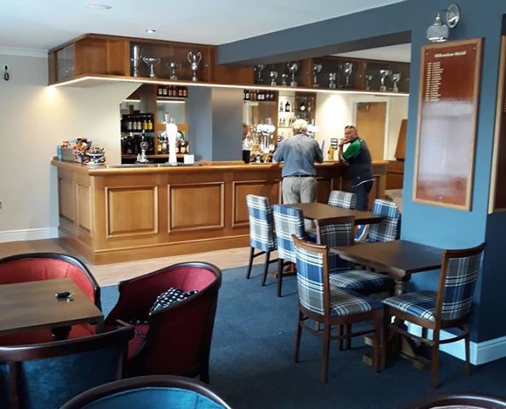 Club bar seating and kitchenette